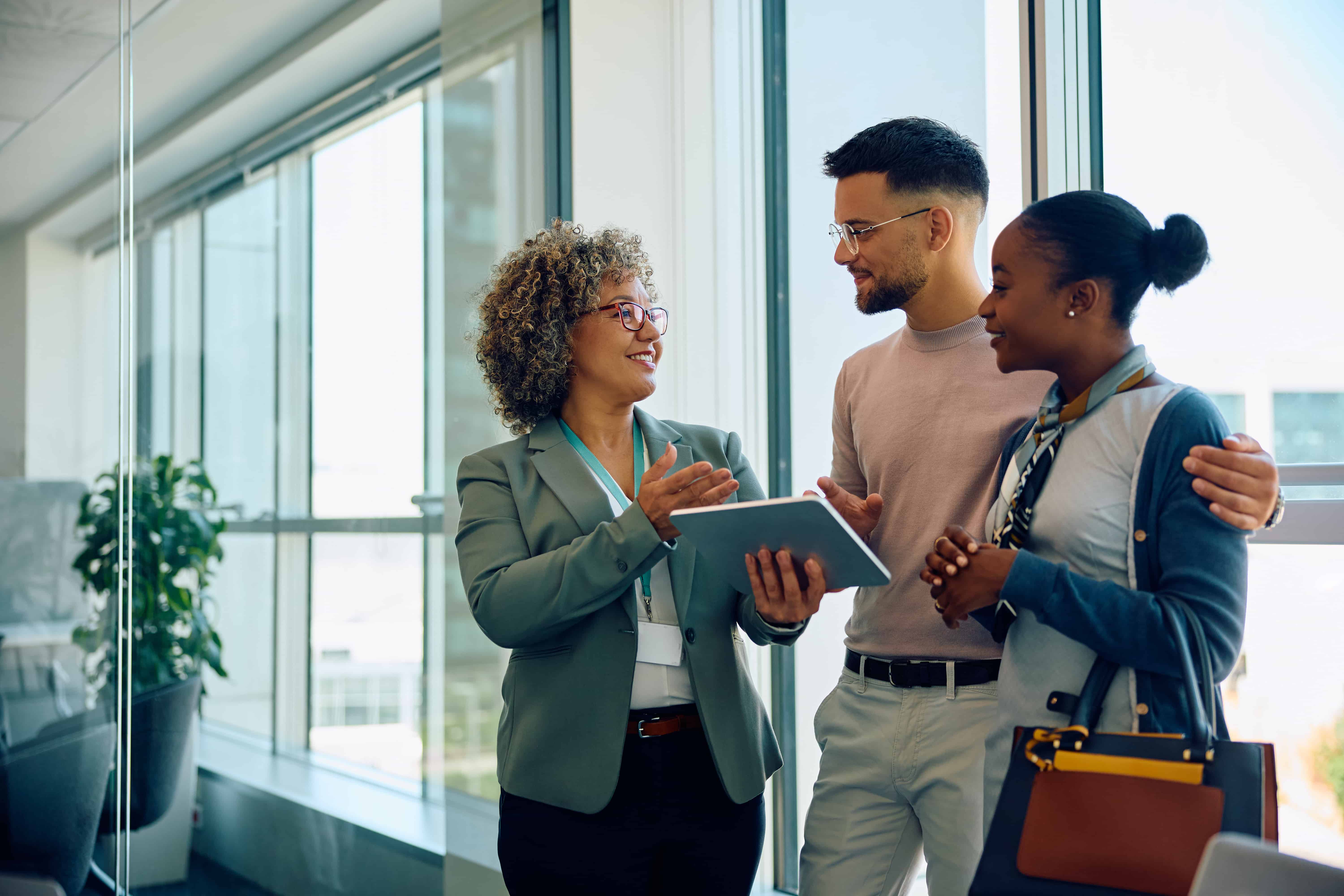 young_couple_talking_to_their_advisor